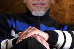 Keeper-Sitting-on-couch-image-1